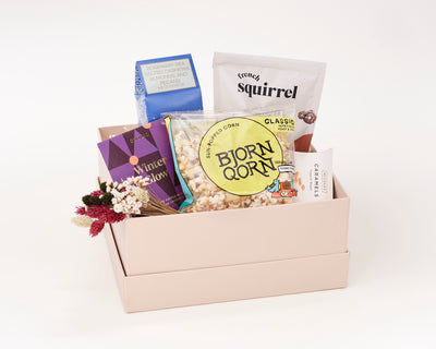 Sweet and Savory Gift box with Bjorn Qorn popcorn, French Squirrel peanut butter and chocolate clusters, McCreas tapped maple caramels, and Q's Nuts.